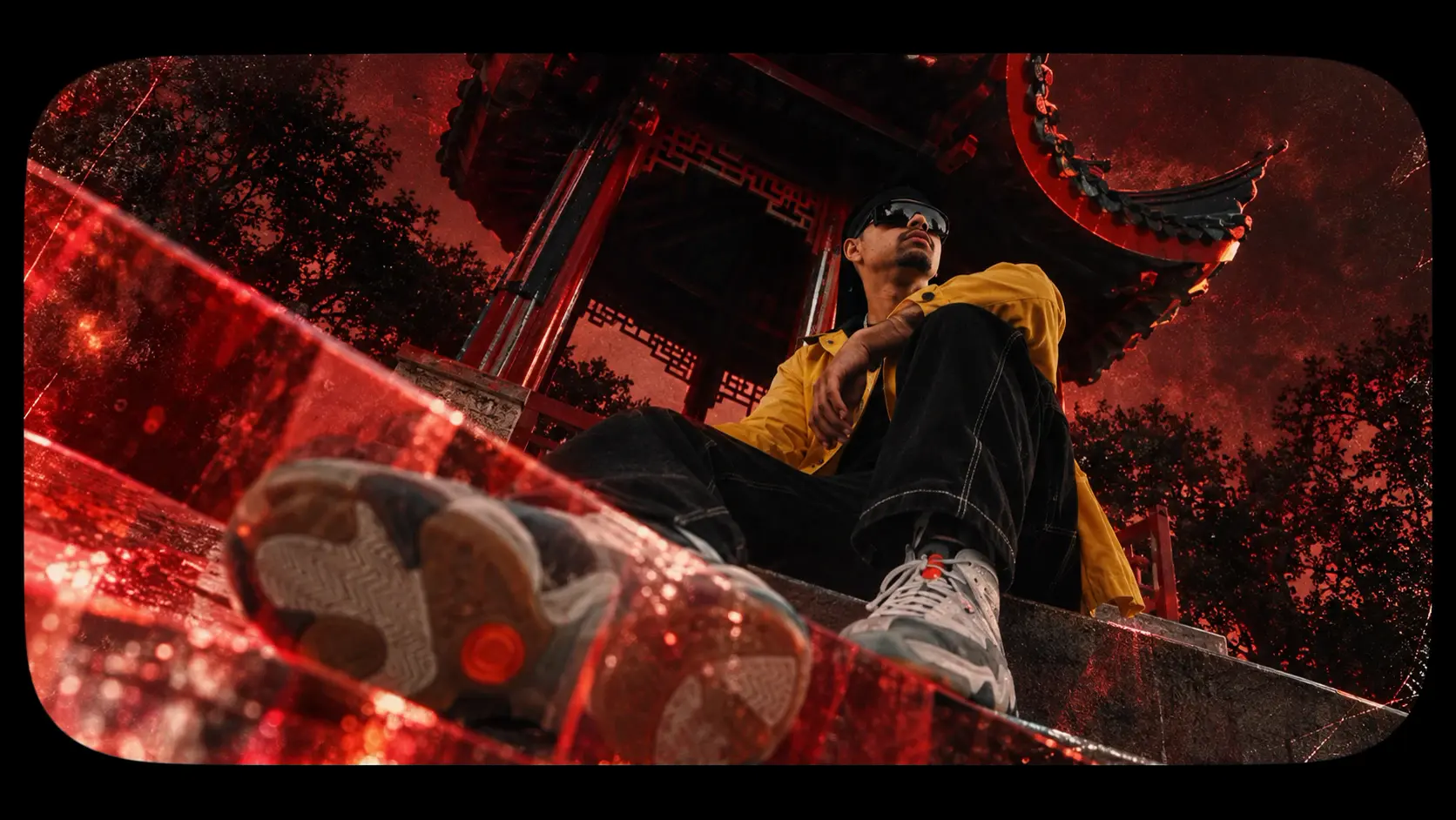 Ri-Flex sitting on temple steps, low angle, red grade