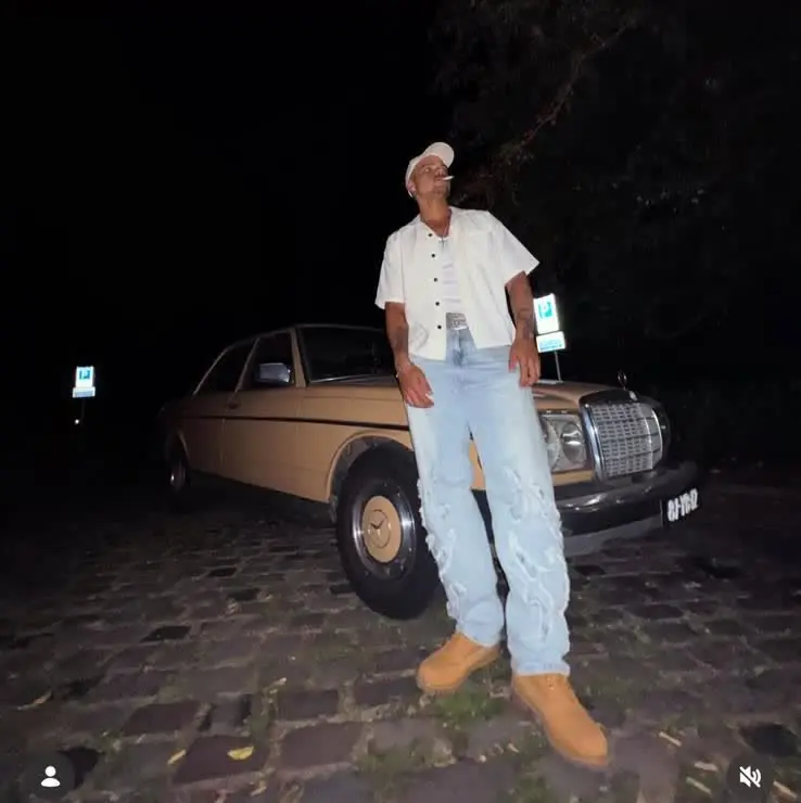 Ri-Flex next to a vintage Mercedes at night