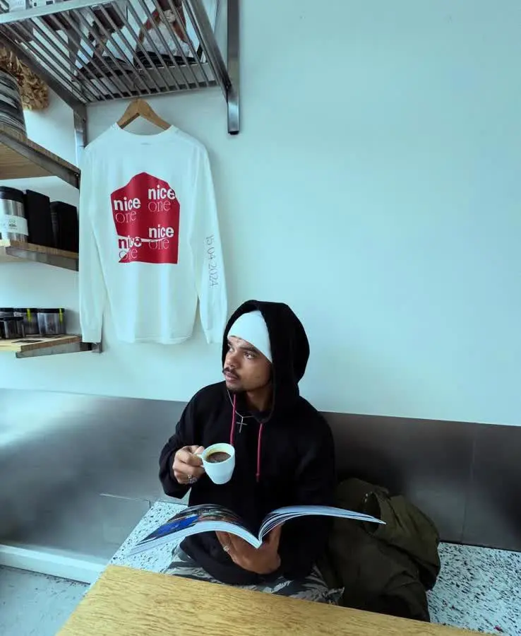 Ri-Flex with a coffee, reading